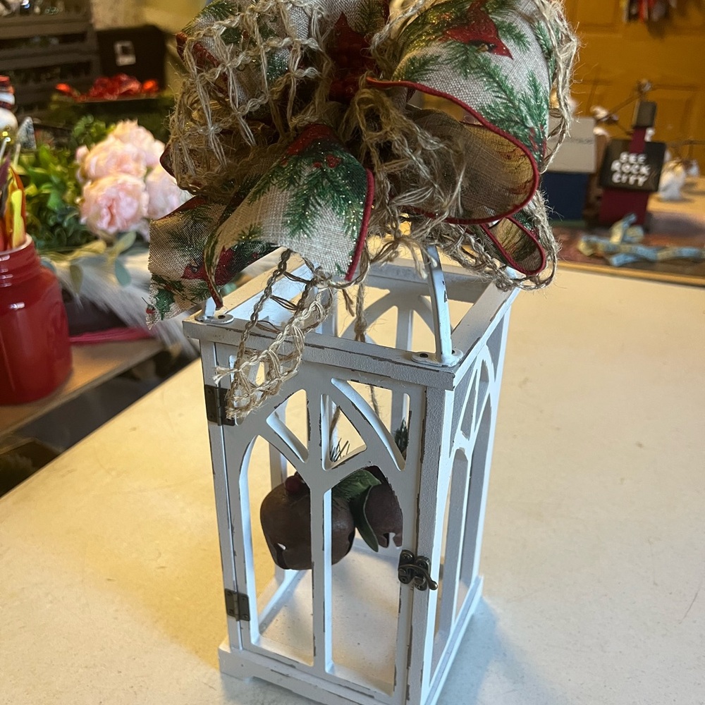 Handcrafted lantern with rustic bells inside